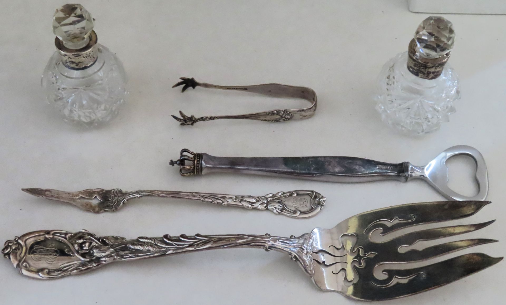 Sundry lot of silver items Inc. small decanters, Sterling Denmark opener, other silver flatware, etc