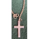 9ct gold cross on 9ct gold chain. Weight approx. 10.2g Used condition, unchecked