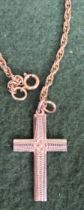 9ct gold cross on 9ct gold chain. Weight approx. 10.2g Used condition, unchecked