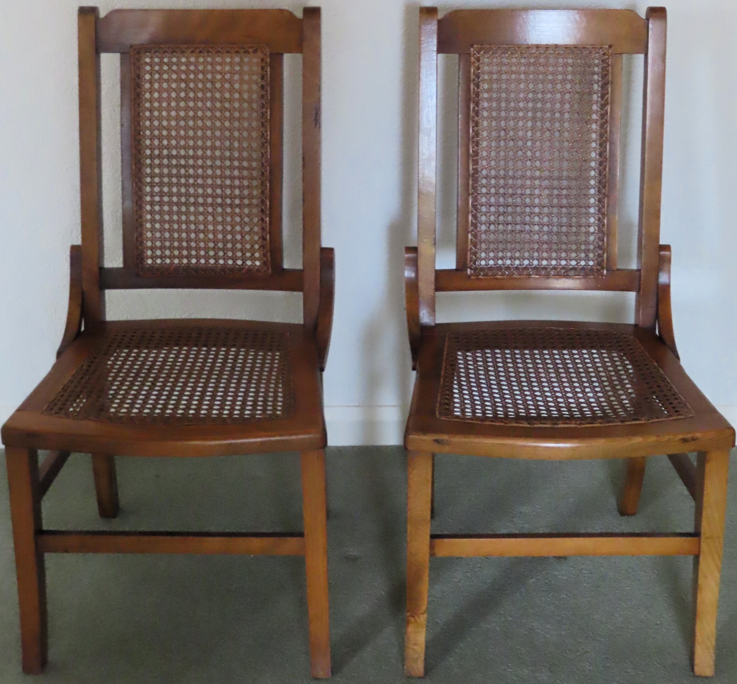 Pair of early 20th century berger seated and backed kitchen chairs. Approx. 86cms H reasonable