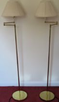 Pair of adjustable 20th cntury standard lmaps with shades. Approx. 149cms H reasonable used