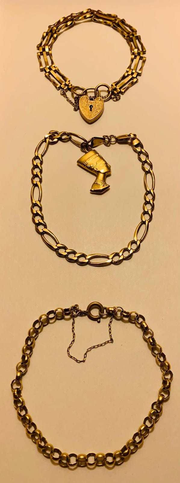 9ct GOLD BRACELET WITH UNMARKED PHARAOH CHARM, WEIGHT APPROX 12.85g, 9ct GOLD GATE CHARM BRACELET