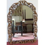 Art Deco bevelled wall mirror with gilded pirecework decoration. Approx. 74 x 51cms reasonable