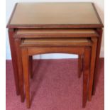 20th century glass topped nest of three tables. Approx. 50 x 53 x 38cms reasonable used condition