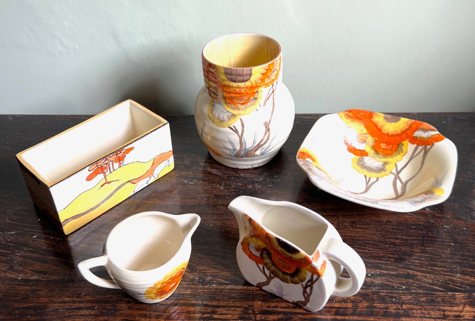 FIVE PIECES OF CLARICE CLIFF BIZARRE POTTERY