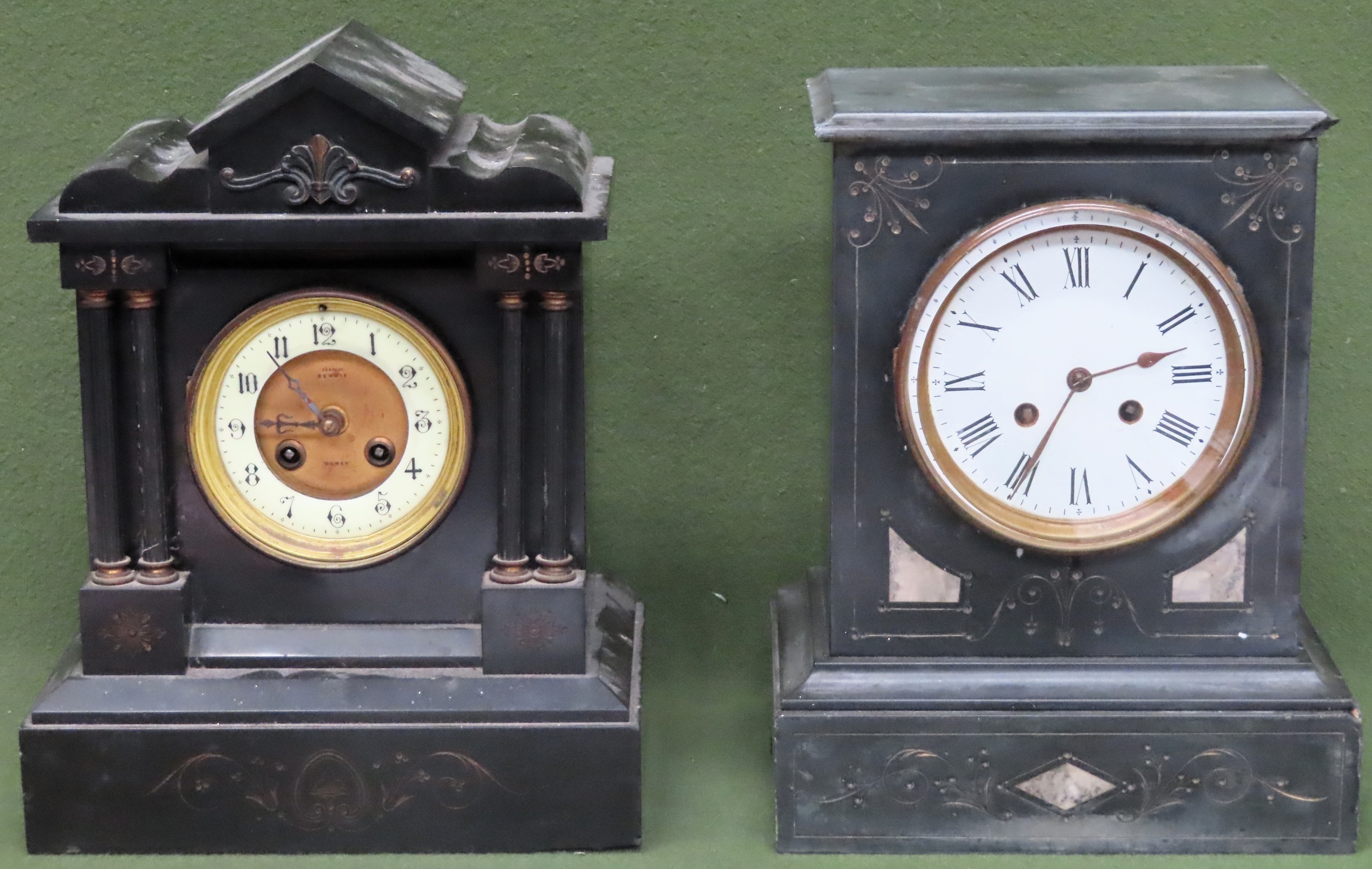 Two large black slate mantle clocks. Largest Approx. 33cm Both in used condition, both have evidence