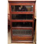 Early 20th century mahogany four tier stacking bookcase with single drawer below. Approx. 157cm H