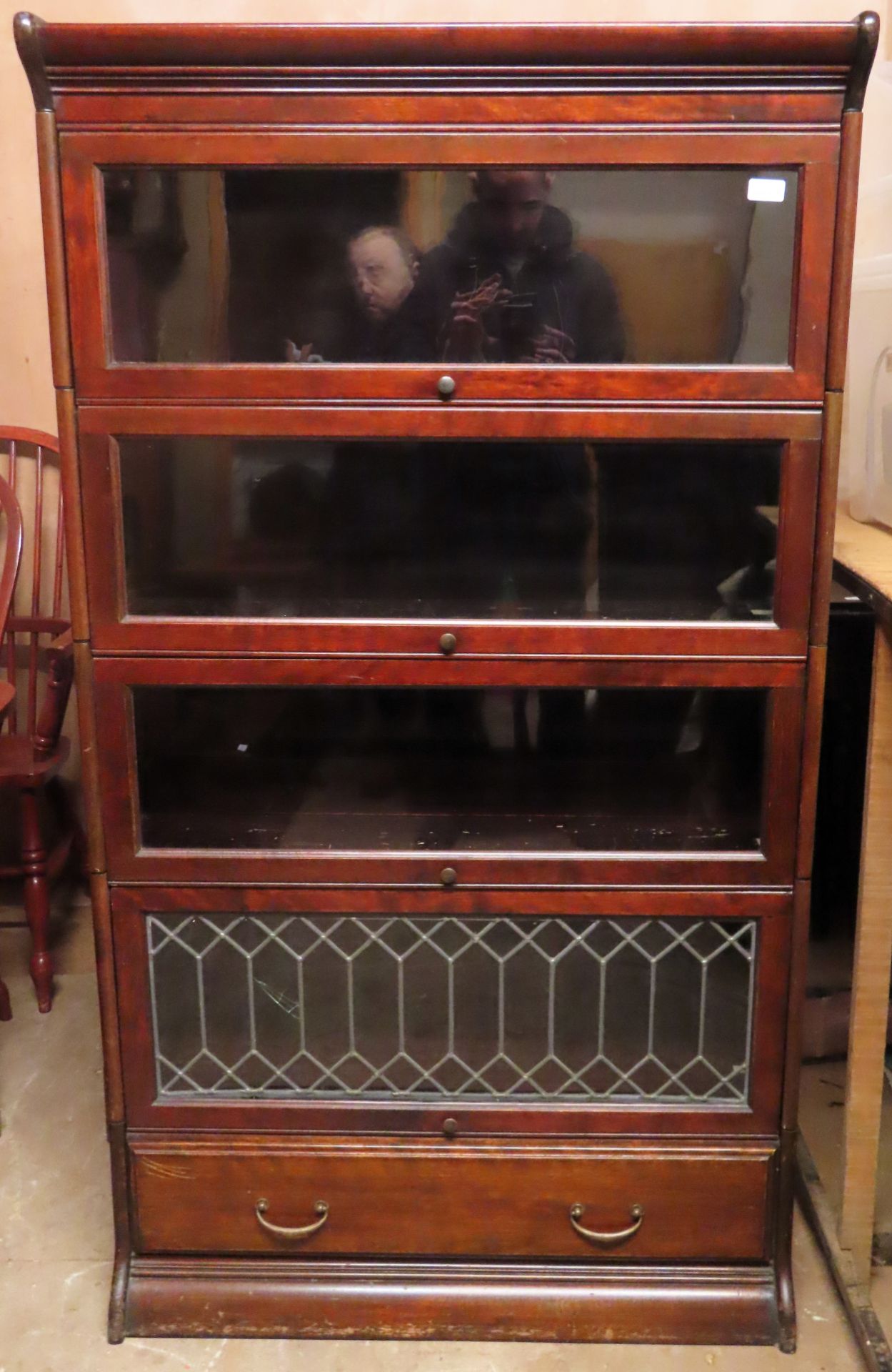 Early 20th century mahogany four tier stacking bookcase with single drawer below. Approx. 157cm H