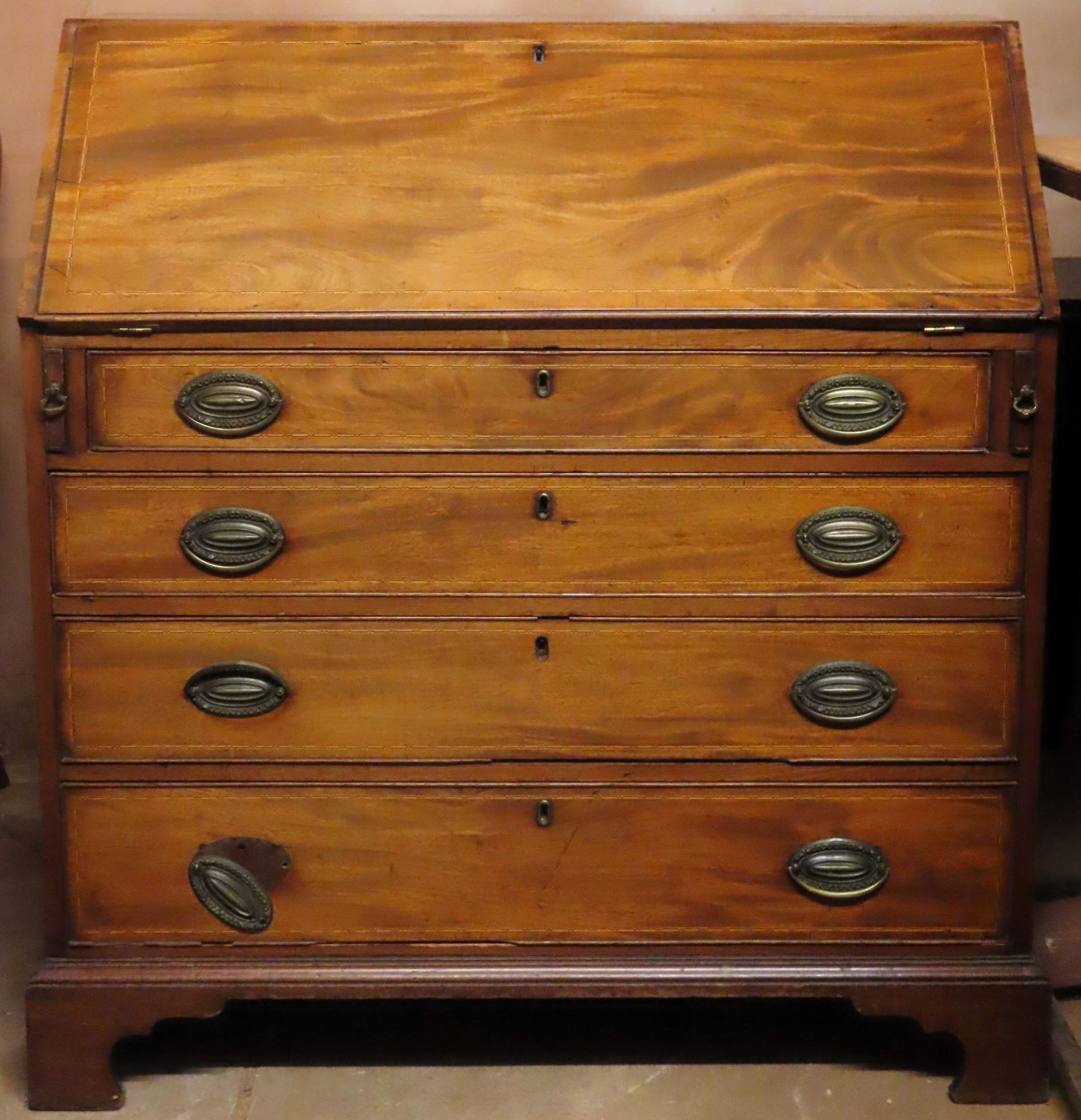 19th century inlaid mahogany writing bureau with fitted interior. Approx. 111cm H x 102cm W x 52cm D