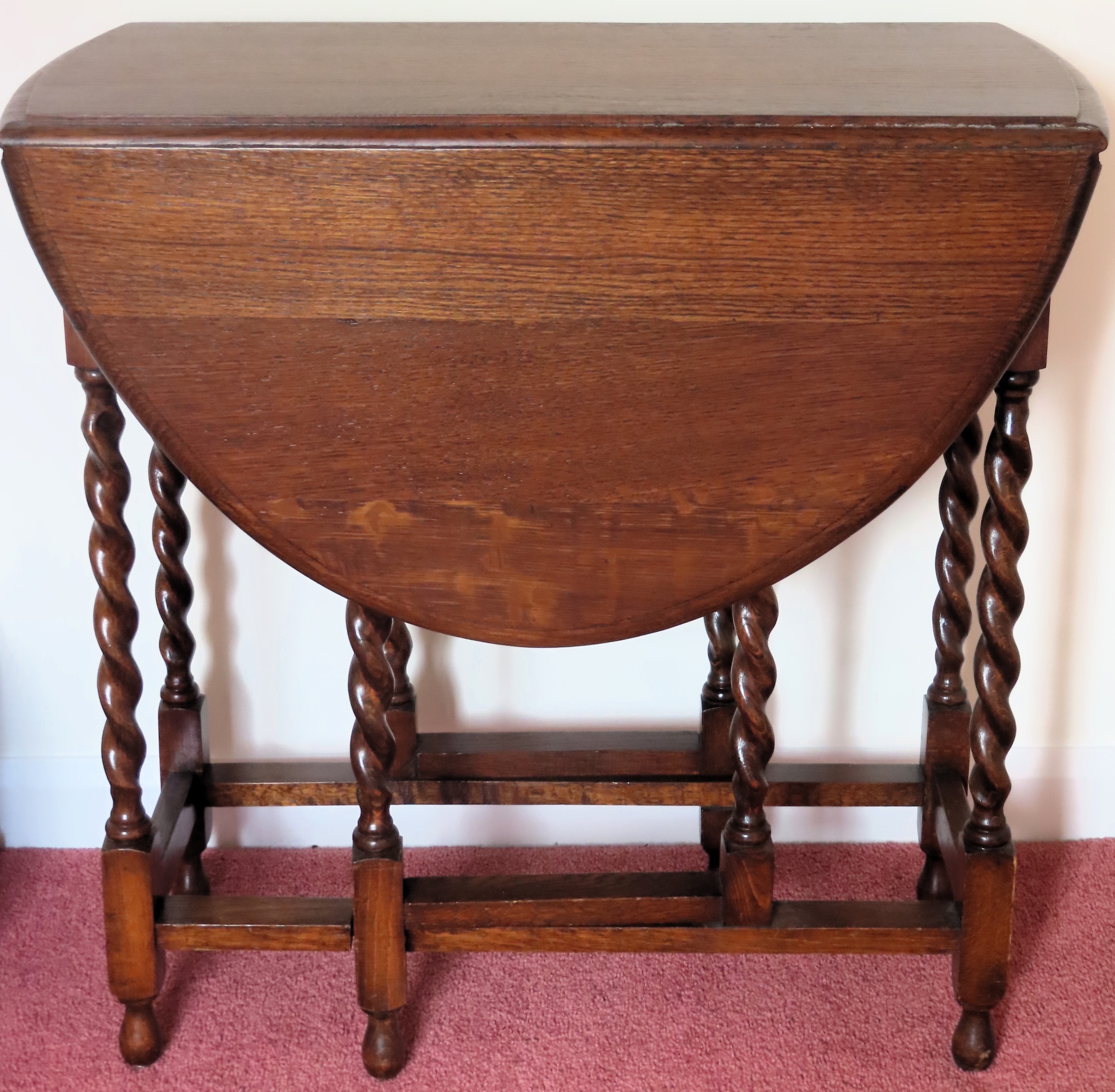 20th century oak small barley twist gateleg table. Approx. 74 x 74 x 103cms reasonable used