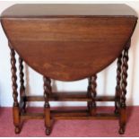 20th century oak small barley twist gateleg table. Approx. 74 x 74 x 103cms reasonable used