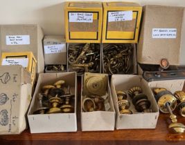 TWO BOXES OF BRASS CASEMENT STAYS, ONE BOX BRASS BOLTS, BRONZE KNOBS, SIX AND HALF PAIRS OF