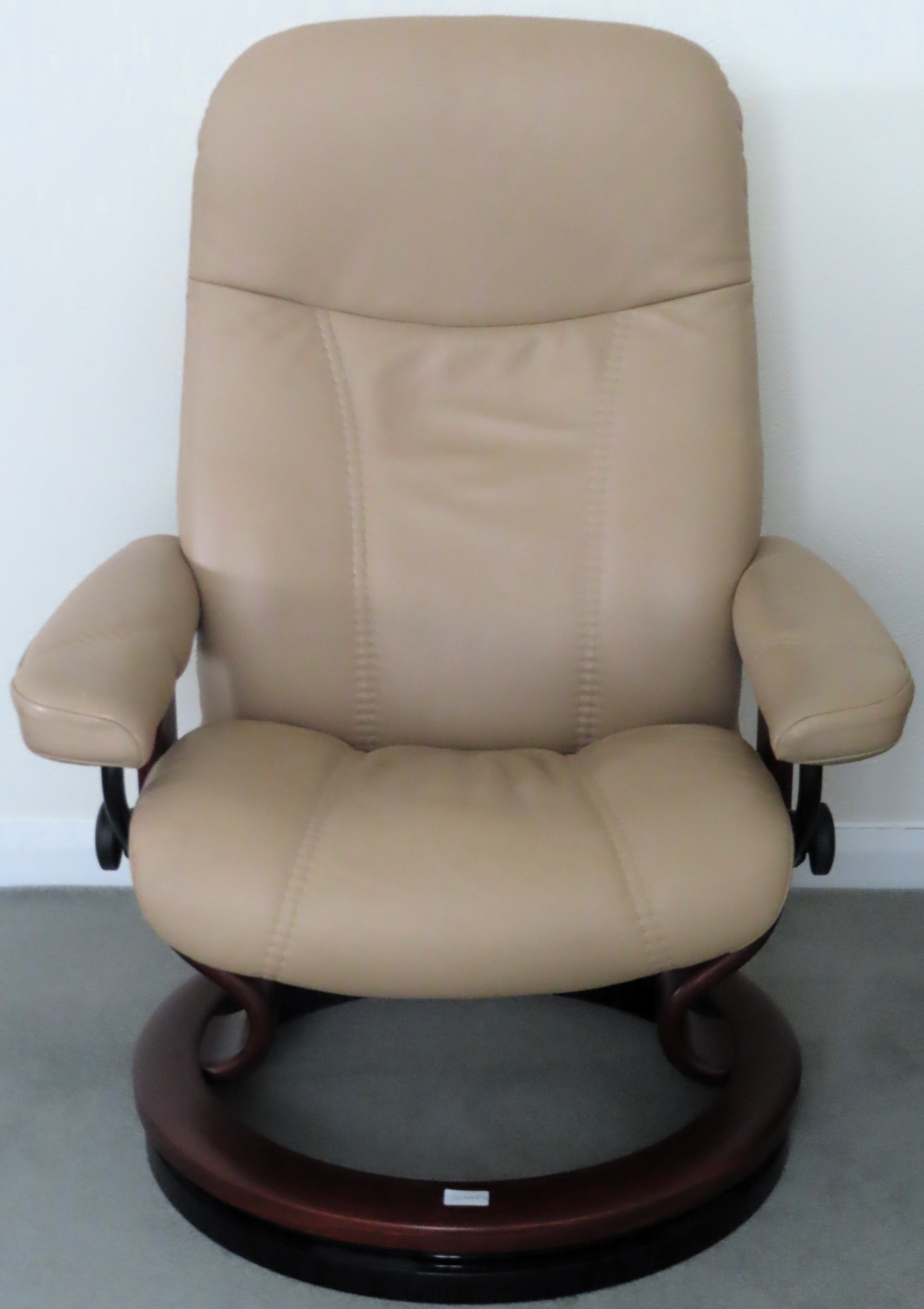 Ekorness 20th century upholstered reclining swivel armchair. Approx. 106cms H reasonable used