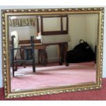 20th century gilded and bevelled wall mirror. Approx. 58 x 63cms reasonable used condition with