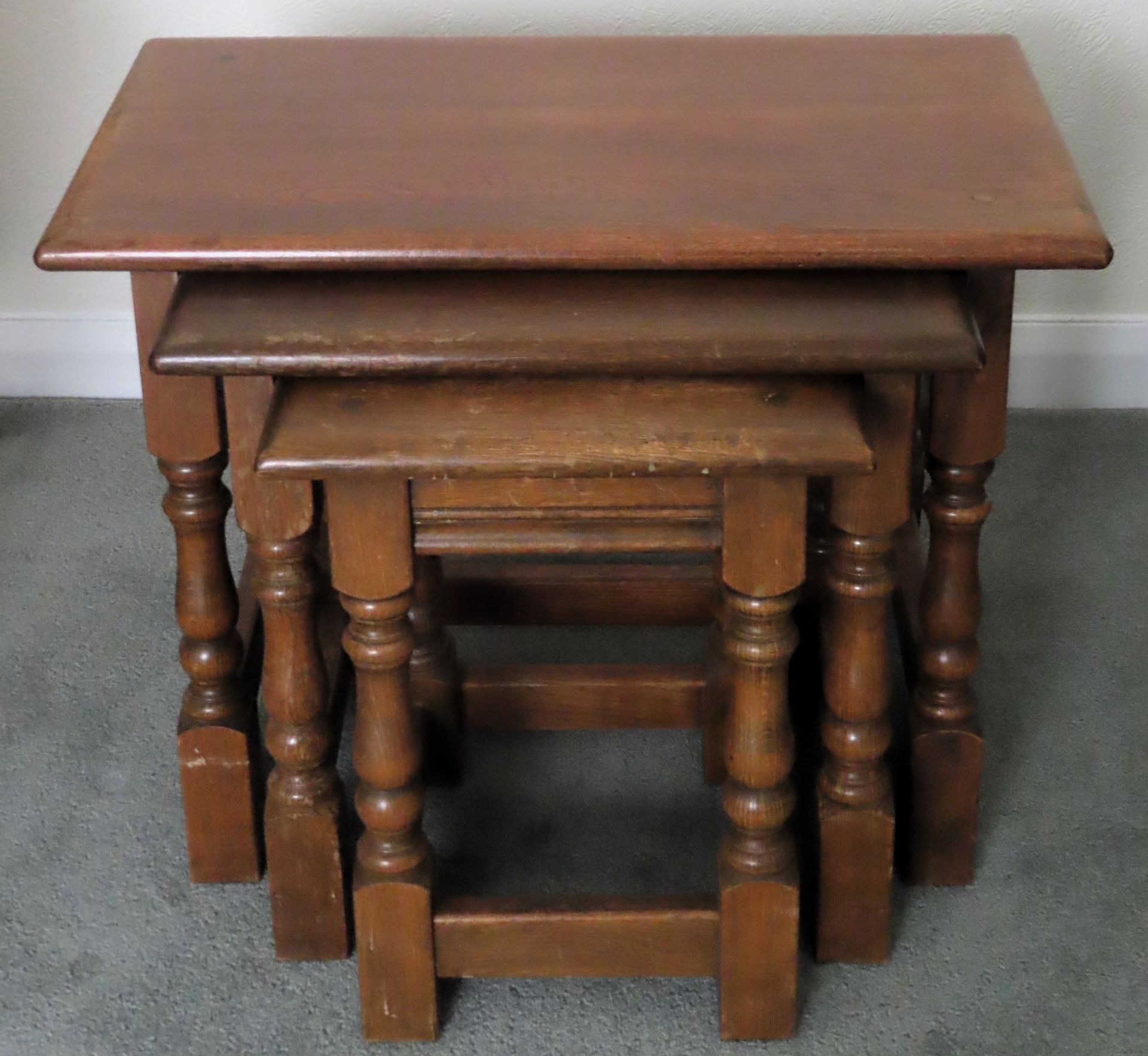 20th century oak nest of three tables. Approx. 45 x 61 x 33cms reasonable used condition with scuffs