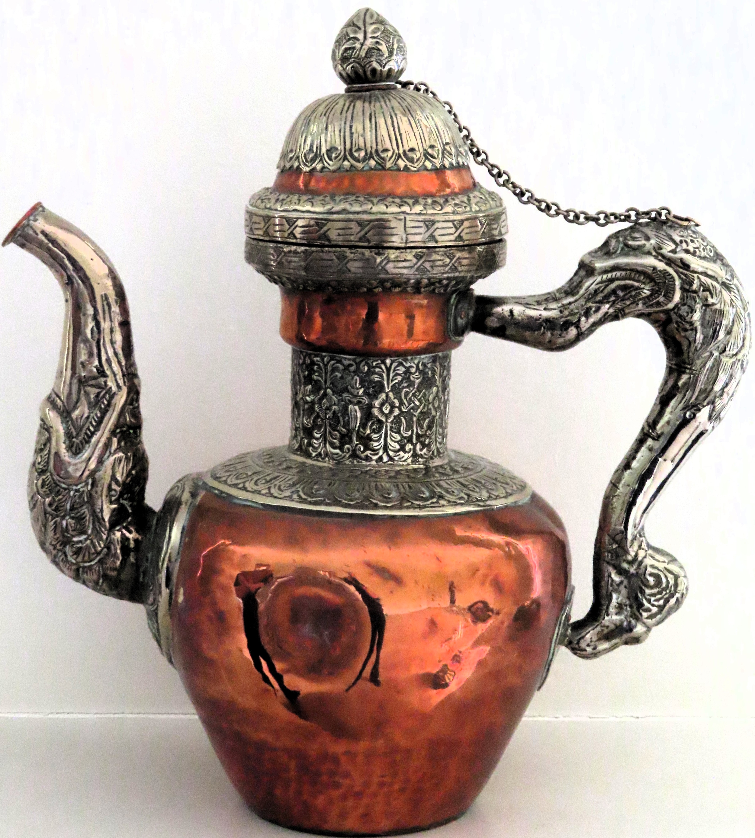 19th century Indian style hammered copper and white metal coffee pot. Approx. 33cms H used with