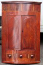 Victorian mahogany bow fronted corner cupboard. Approx. 122 X 80cm Used condition. scuffs, scratches