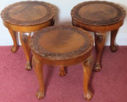 Three small 20th century circular carved mahogany pie crust edged tables on ball and claw supports