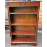 20th century inlaid mahogany open bookshelves. Approx. 125cm H x 79.5cm W x 30.5cm D Used condition,