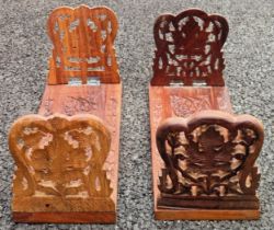 Two sets of carved wooden bookracks Reasonable used condition, scuffs and scratches