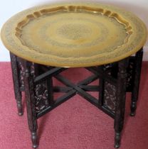 Early 20th century ebonised brass topped folding Cairo table. Approx. 46 x 59.5cms D used