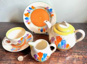 CLARICE CLIFF TEA POT, CREAMER, SIDE PLATE, CUP AND SAUCER, CROCUS PATTERN