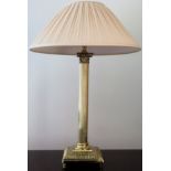 20th century brass column form table lamp with shade. Approx. 68cms H reasonable used condition