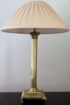 20th century brass column form table lamp with shade. Approx. 68cms H reasonable used condition