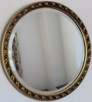 20th century gilded and bevelled circular wall mirror. Approx. 46cms D reasonable used condition
