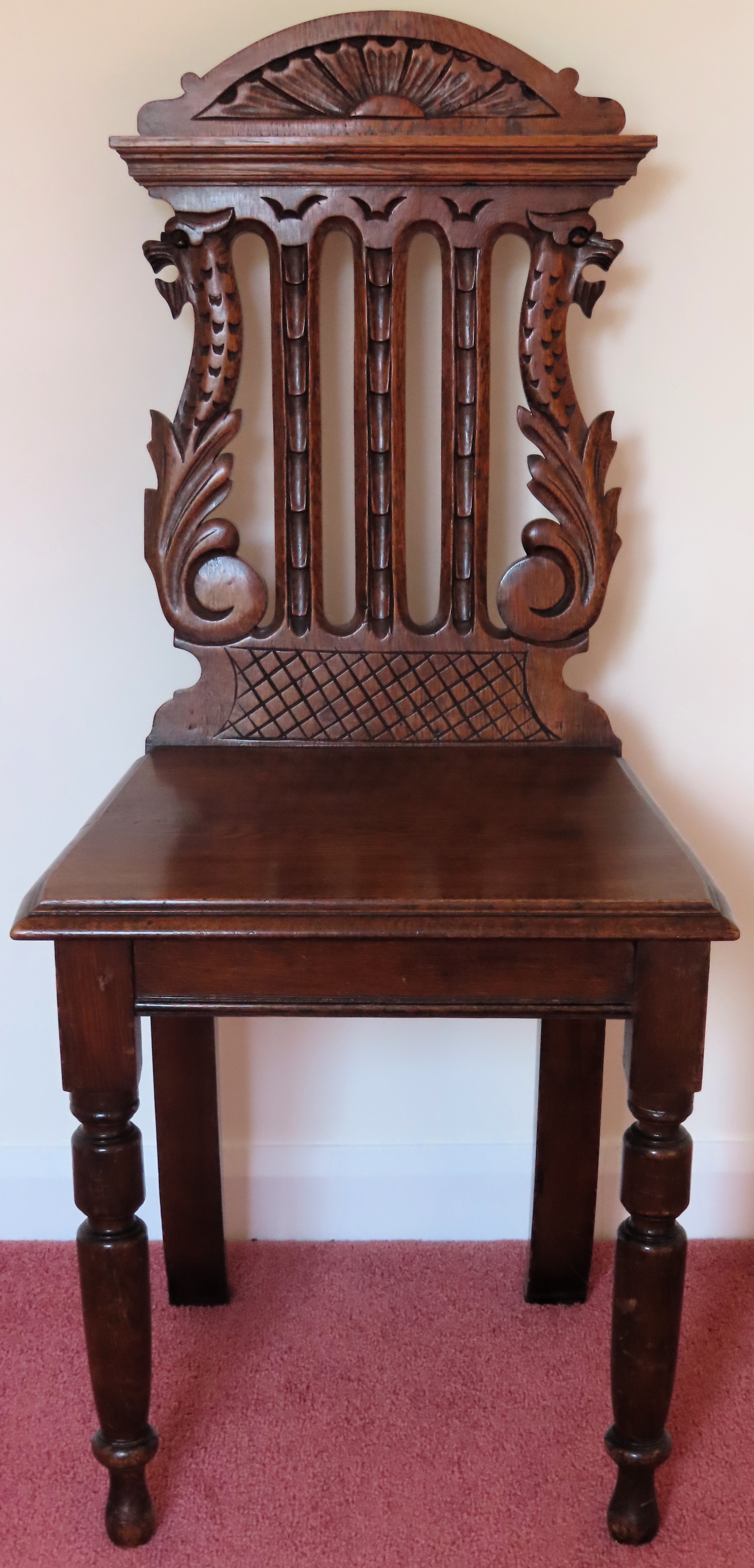 20th century carved and piercework decorated hall chair. Approx. 102cms H reasonable used