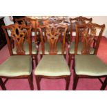 Set of 6 (4+2) carved 20th century mahogany piercework decorated dining chairs. Approx. 102cms H