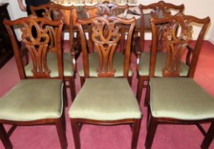 Set of 6 (4+2) carved 20th century mahogany piercework decorated dining chairs. Approx. 102cms H