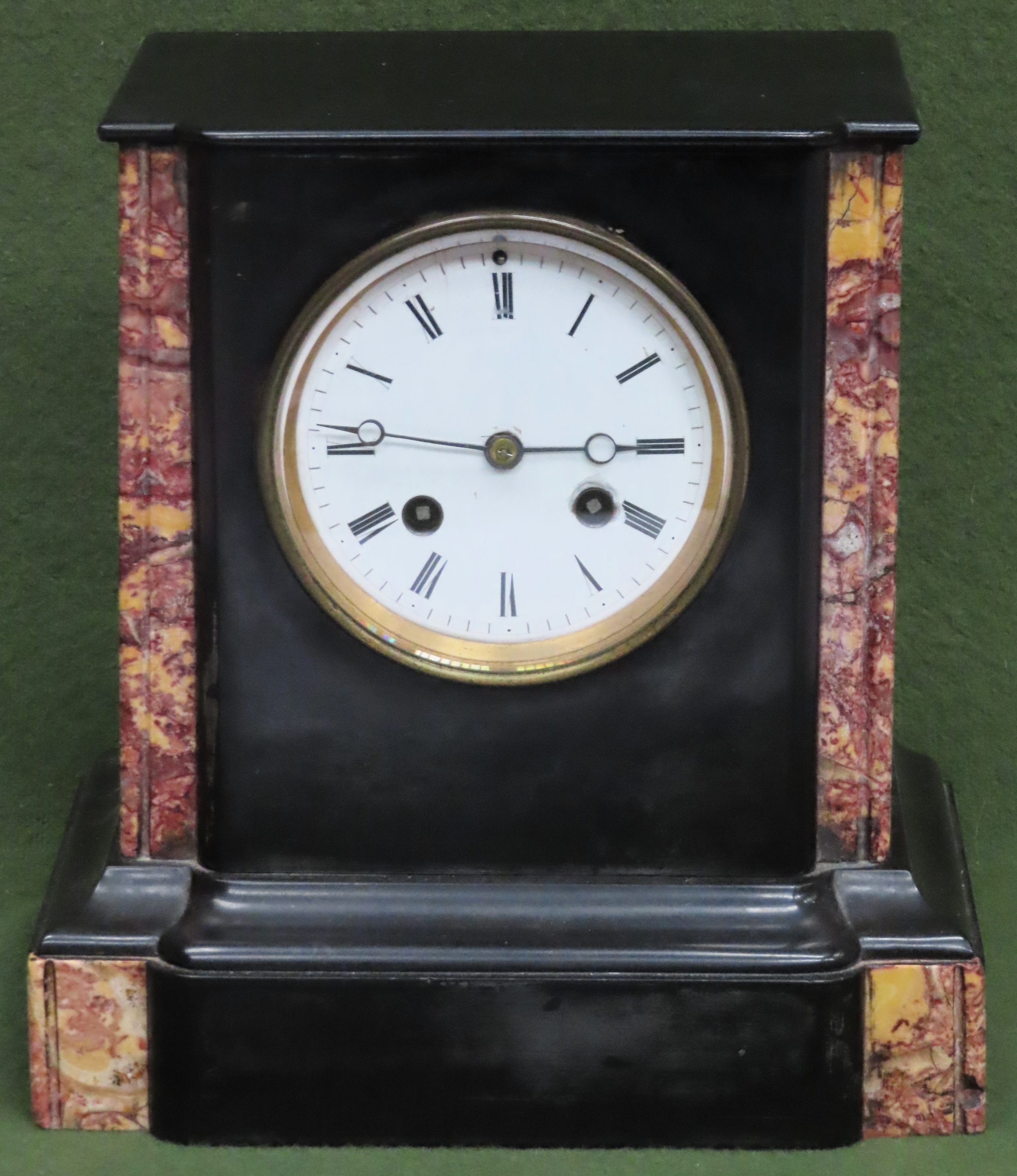 Vintage black slate mantle clock with enamelled circular dial. Approx. 23cm Used condition, not