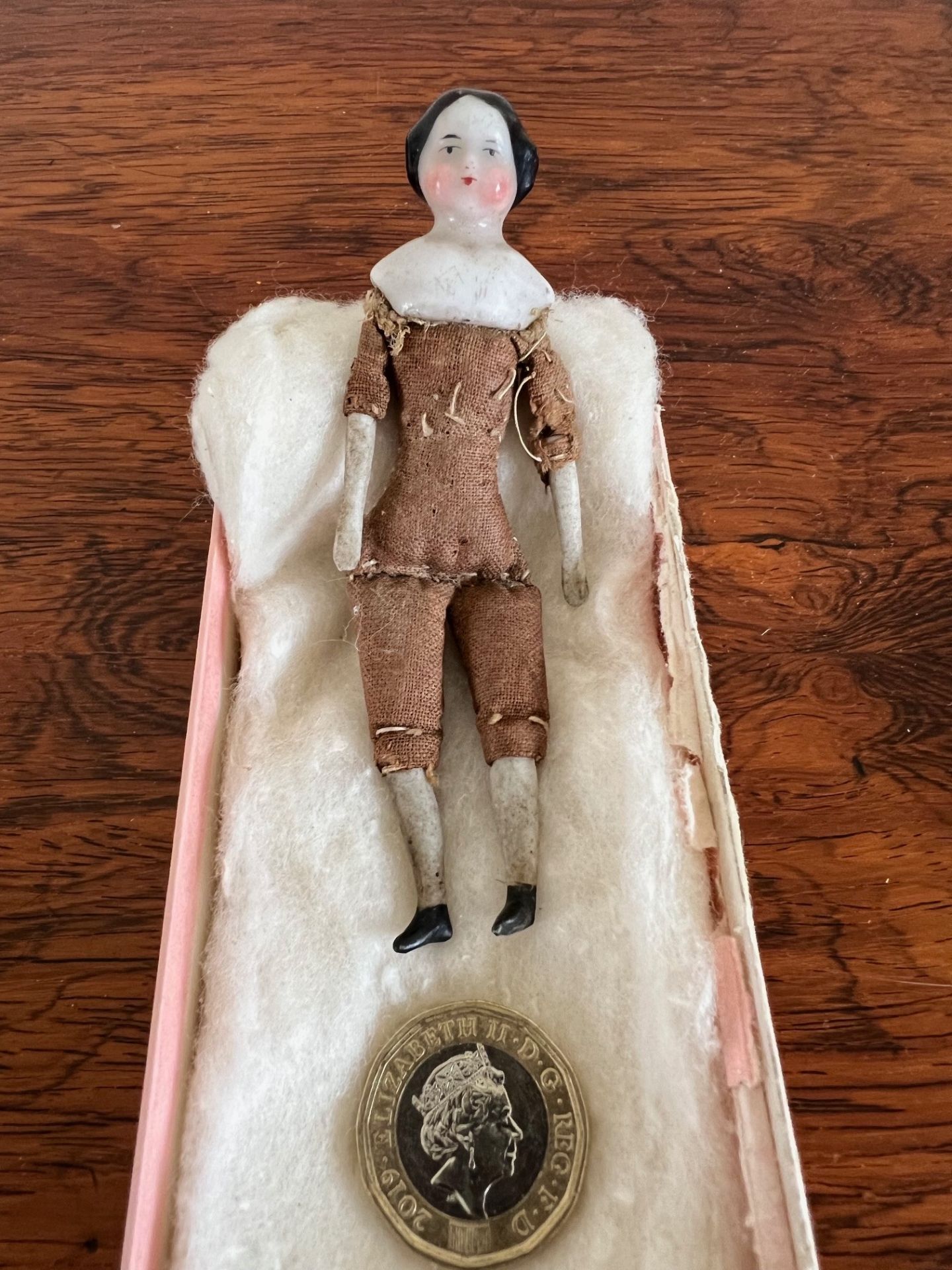 MINIATURE DOLL WITH PORCELAIN HEAD, ARMS AND LEGS, CLOTH BODY