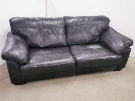 A button backed grey upholstered two seater sofa/ settee together with a matching armchair, sofa 135