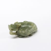A Chinese carved jade/hardstone mythical animal with tortoise body and dragon head, L. 10cm.