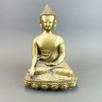 A large Chinese mid 20th century brass Buddha, H. 34cm.