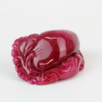 A Chinese carved pink tourmeline desk weight, W. 6.5cm.