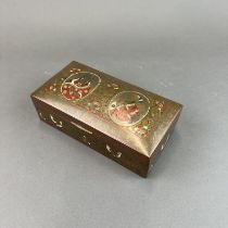 An early 20th century Indian enameled brass cigarette box. 18 x 9 x 7cm (slightly a/f)