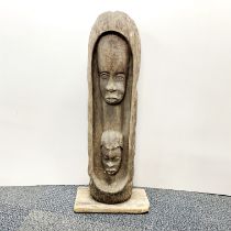 A large African carved wooden figure, H. 79cm.