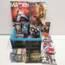 A collection of Iron Maiden VHS tape cassettes etc.