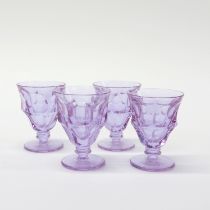 A set of four antique Moser "Alexandrite" liqueur glasses, H. 6.2cm. Colour changes in different