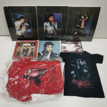 A mixed collection of Michael Jackson memorabilia.