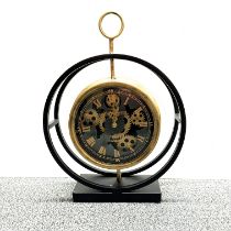 An interesting contemporary metal clock, H. 42cm.