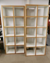 A pair of heavy ten section oak effect and white finish display/ bookshelves, 210 x 89 x 39cm.
