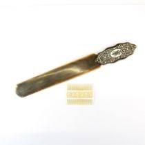 A 19th /early 20thC Indian horn and camel bone page turner, L. 72cm. Together with a carved camel