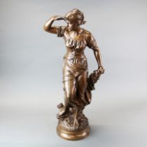 A large French bronze figure of a young fisherwoman, H. 68cm.