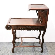 A Chinese carved hardwood two tier side table, 92 x 69 x 32cm.