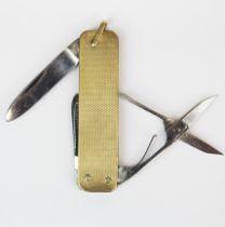 A 9ct gold covered pen knife with folding scissors, L. 6cm.