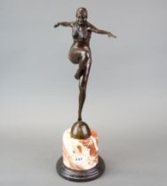 A large Art Deco style figure of a dancer on a marble base, H. 54cm.